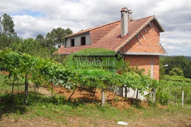 Foto 518086b2-80f2-45b2-b6f9-decd9a15faf9. House with parking in Ramirás
