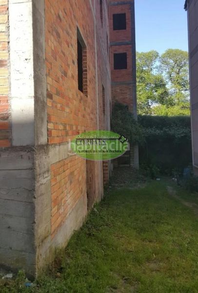 Foto 4cee9467-43ef-4359-af3a-affc5cf22153. Edificio in Maceda