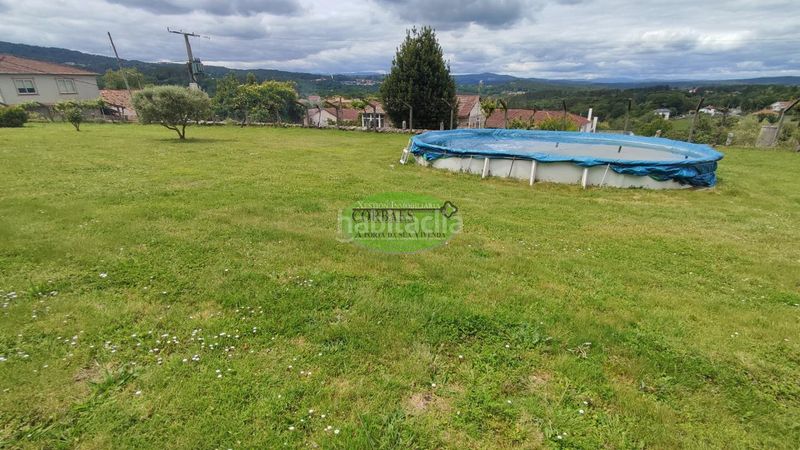 Foto c0b6c890-a9ba-4325-9d15-db101d27b2e1. Xalet amb calefacció aparcament piscina a Ramirás