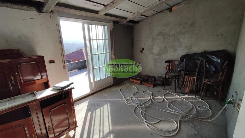 Foto b49956d9-2d97-4549-ba2f-fdfb5d111ced. Casa en Ramirás