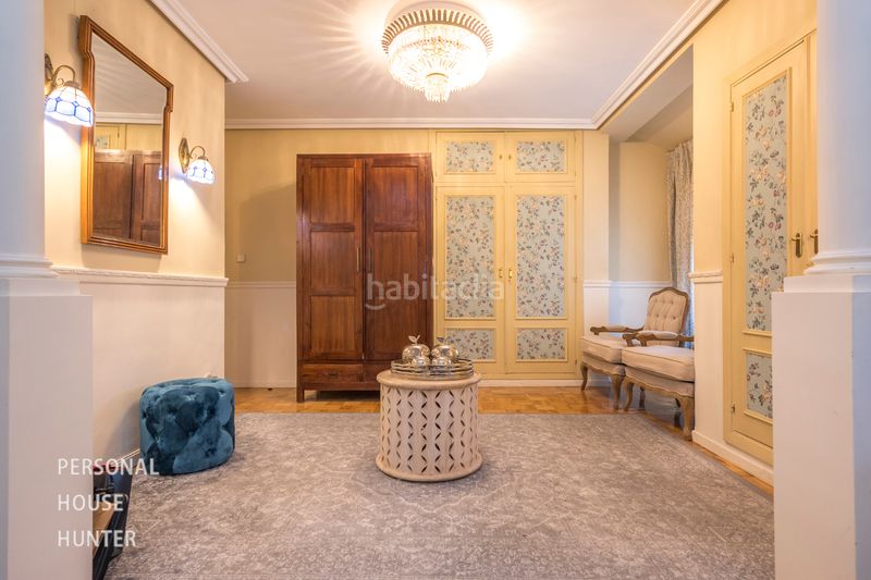 Foto 6a1e5321-c7ab-4fac-bce6-a27f6c5c3eef. Casa adossada amb xemeneia calefacció aparcament piscina a Boadilla del Monte