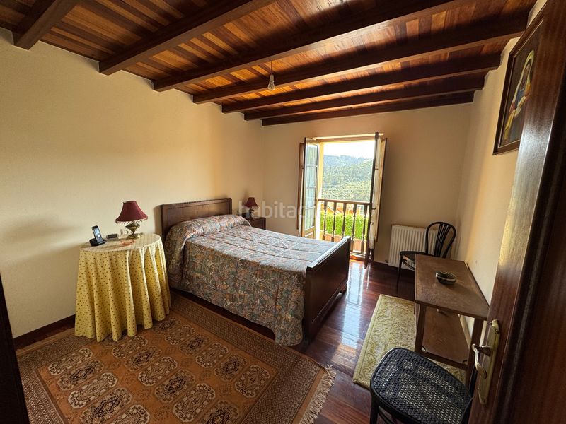 Foto 779b7974-8717-44f1-be05-2efa197dd155. Casa aparellada amb xemeneia calefacció aparcament a Cudillero