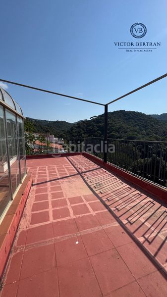 Foto 539f1aaa-df34-485c-b817-4802b60bee22. Casa adossada amb xemeneia calefacció aparcament piscina a Sant Cebrià de Vallalta