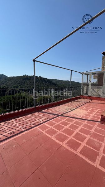 Foto 6be18077-4d53-4545-8f73-0d202985a3ec. Casa adossada amb xemeneia calefacció aparcament piscina a Sant Cebrià de Vallalta