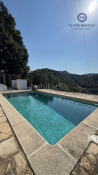 Foto 9d3b5ce5-72f7-4768-bb4f-83d700c3dc13. Casa adossada amb xemeneia calefacció aparcament piscina a Sant Cebrià de Vallalta