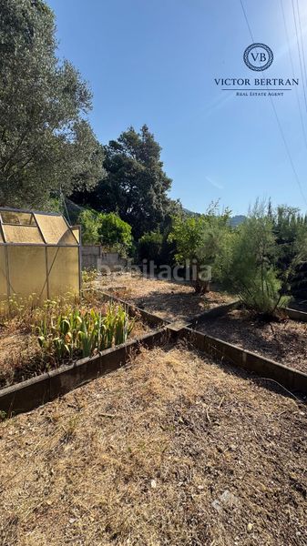 Foto ddf26bfc-c485-46e1-b367-fd62130447d2. Casa adossada amb xemeneia calefacció aparcament piscina a Sant Cebrià de Vallalta