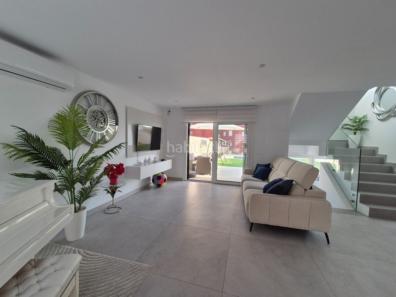 Foto dc6c2e64-7063-4019-af71-094ea7baa31e. Casa adossada amb aparcament a Almerimar Ejido (El)