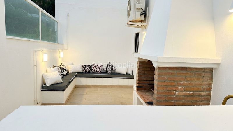Foto 4c078a1e-1f9e-4eb7-8308-97743a051b74. Xalet amb xemeneia aparcament piscina a Chullera Manilva