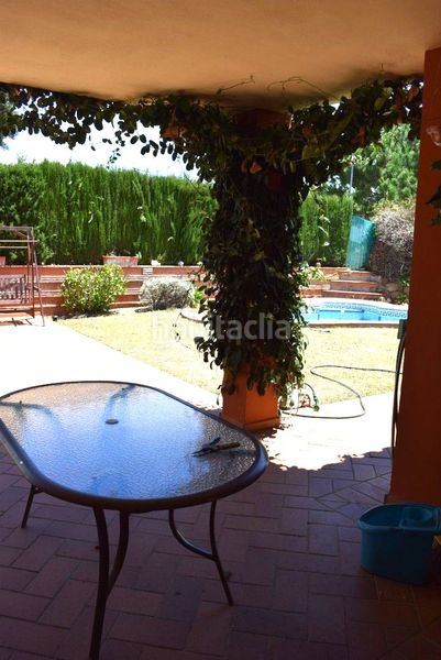 Foto 926d603d-e89b-4452-a5ef-66106b6773d8. Casa aparellada amb aparcament piscina a Puerto de la Duquesa Manilva