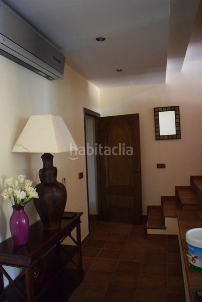 Foto b9a2a397-add6-415e-acd5-8a317a0b0168. Casa aparellada amb aparcament piscina a Puerto de la Duquesa Manilva