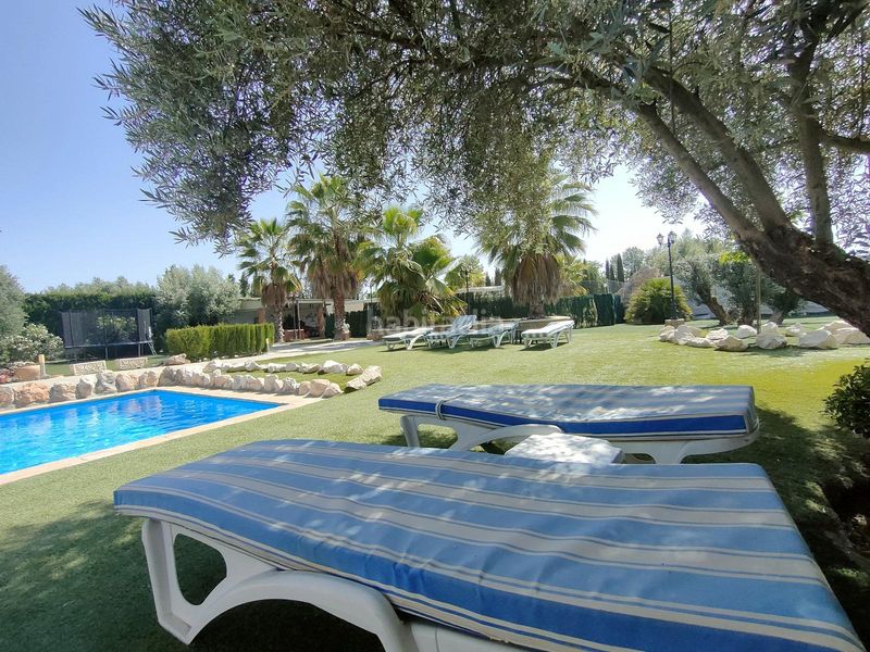 Foto 48646af1-f853-4bf9-91d7-e8f427c09026. Masia amb xemeneia calefacció aparcament piscina a Atarfe
