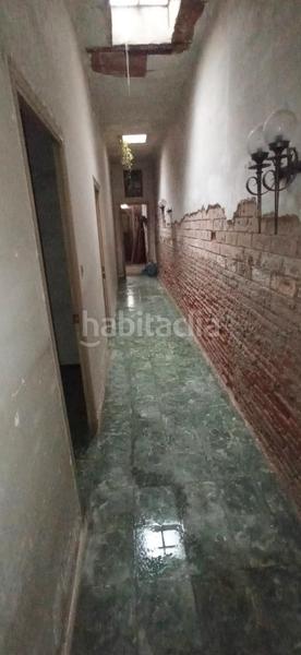 Foto af12de10-5ef1-47e1-9c25-8df241cd3280. Casa pareada gran oportunidad de inversión: casa en venta para reforma integral en Granollers