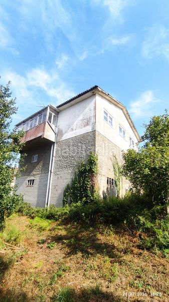 Foto e1df9521-5c83-496c-8edd-5ecc49ede8c6. Casa amb calefacció a Mesoiro Coruña (A)