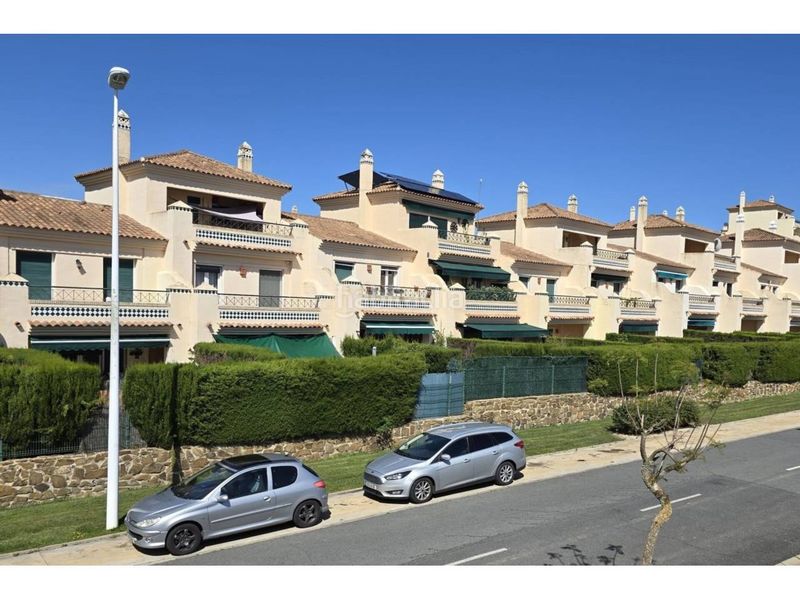 Foto 1532846f-62b9-4d7b-8be4-6ddedd60acd1. Casa aparellada amb aparcament piscina a Costa Esuri Ayamonte