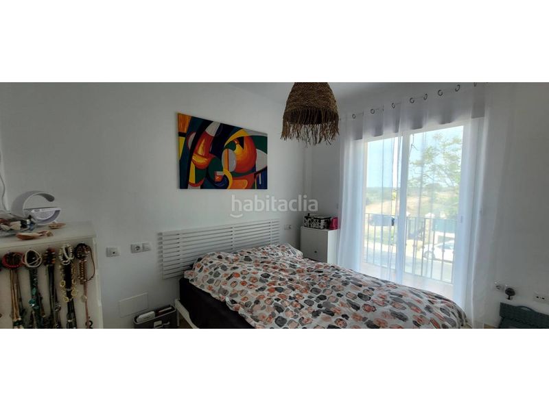 Foto 1b2e91a9-e65e-4381-877c-f098e1adb994. Casa aparellada amb aparcament piscina a Costa Esuri Ayamonte