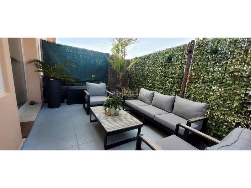 Foto e23e588b-7829-47d4-9c15-e268edd70073. Casa aparellada amb aparcament piscina a Costa Esuri Ayamonte