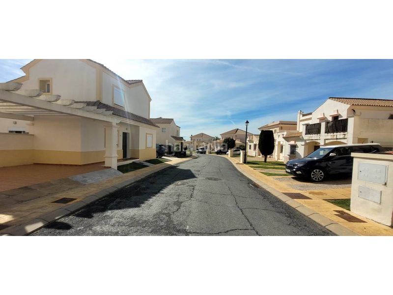 Foto ffc15672-bf2a-461e-98b2-aa4edf69c606. Casa aparellada amb aparcament piscina a Costa Esuri Ayamonte