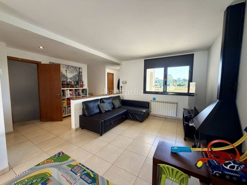 Foto 85e592f0-a142-458e-9d86-2c6c00ce35d9. Casa adosada  en venta en Centre Vidreres