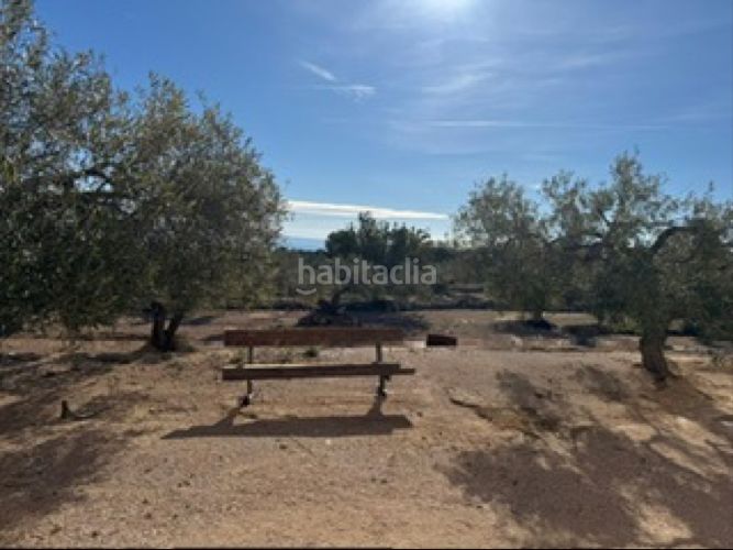 Foto 293a22a8-6b76-48d1-80e9-86316ee06653. Masia amb xemeneia aparcament a L´Ametlla de Mar Ametlla de Mar (L´)