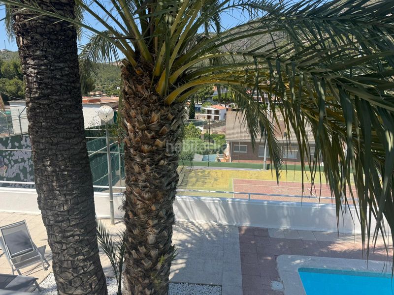 Foto ae299377-1c0a-4eac-b860-c23385a93767. Casa adossada amb xemeneia calefacció aparcament piscina a Castelldefels