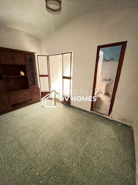 Foto c56d24cb-171a-4295-9313-995ef1d7e624. Casa adossada a Casco Antiguo Cáceres