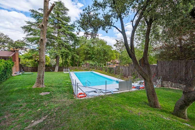 Foto acce83a8-95d0-4b1f-852c-77292df7c20f. Casa adossada amb calefacció aparcament piscina a Boadilla del Monte