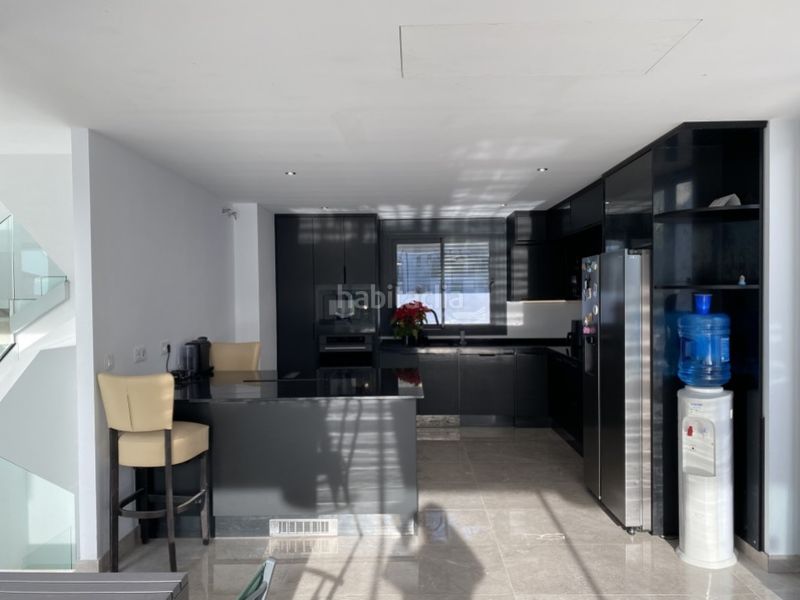 Foto 467a9063-bffb-42f1-a875-079e2566a1f7. Casa amb aparcament a Golf Bahía Finestrat