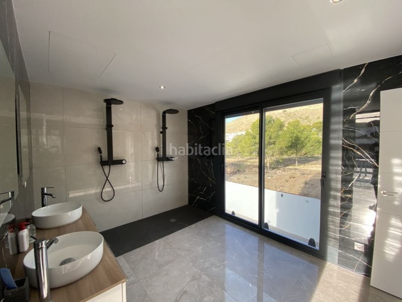 Foto 4797a904-688d-428f-bed8-3bea9c384cc4. Casa amb aparcament a Golf Bahía Finestrat