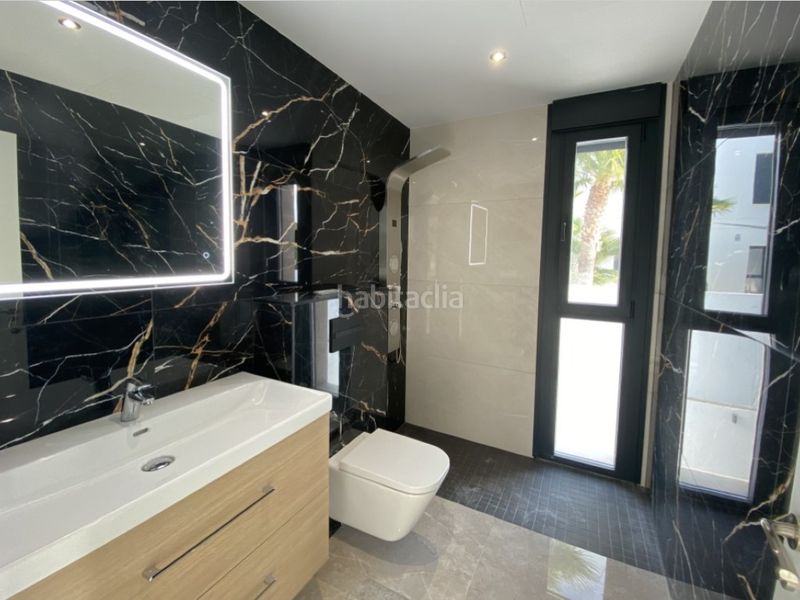Foto 7c693d8d-f32c-4ef0-8d56-b26b9739e061. Casa amb aparcament a Golf Bahía Finestrat