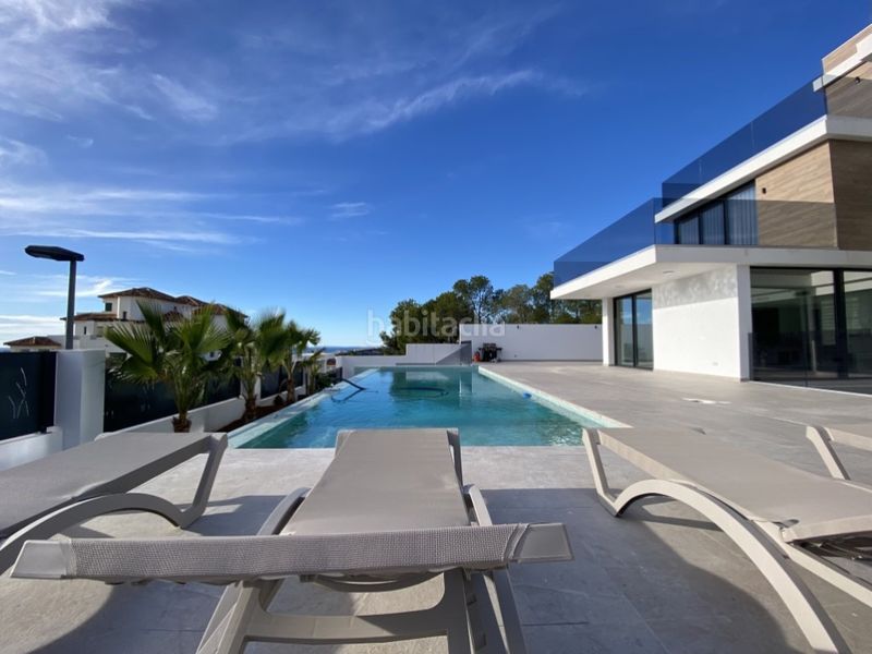 Foto e448142d-705e-467c-9f71-1b8d067985e8. Casa amb aparcament a Golf Bahía Finestrat