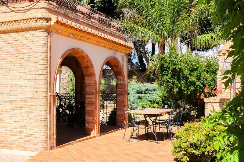Foto a32e8c77-c745-4f9a-b773-ea30451c7903. Casa amb xemeneia a Los Urrutias Cartagena