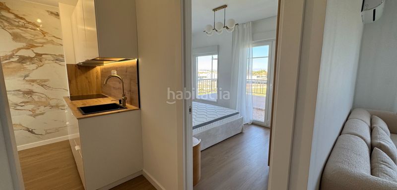 Foto 45cd1a7e-e0d3-45e2-8bfe-10f1516a7121. Apartament a Punta Prima Torrevieja