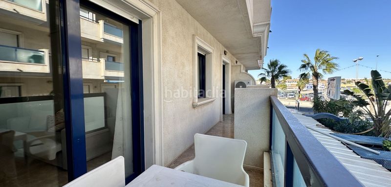 Foto b5b7c8f9-10f3-44fb-a828-b3eba386d340. Apartament amb piscina a Aguamarina Orihuela