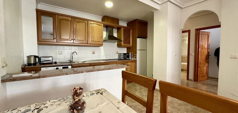 Foto d29e52b8-441d-4efd-8212-c89c6416be59. Apartament amb piscina a Aguamarina Orihuela