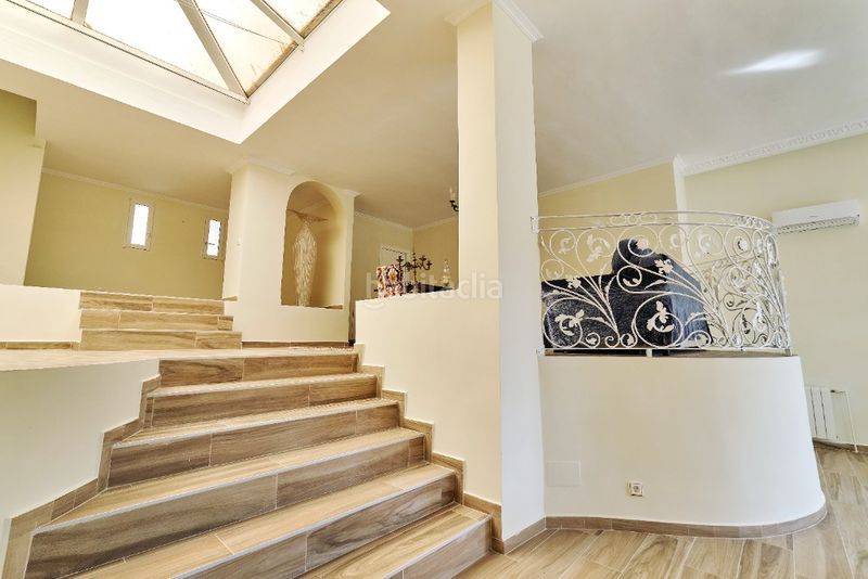 Foto b8456bed-9cbd-4ec2-9f1b-21c2d65360e3. Casa amb xemeneia a Campoamor Orihuela