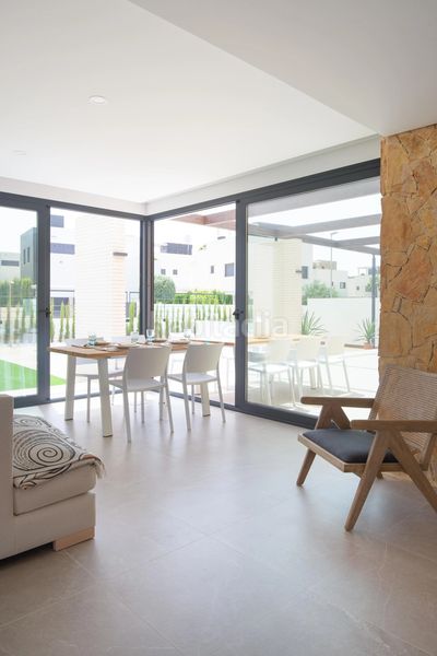 Foto f0a467e0-b22e-4983-be5b-7a7bf44073e2. Casa amb xemeneia piscina a Campoamor Orihuela