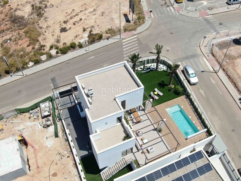 Foto 59e3b029-4ad3-4581-a80a-26815d8e2336. Casa amb xemeneia piscina a Campoamor Orihuela