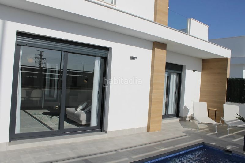 Foto c5c11868-21ee-4196-9937-fcb82eb43e3e. Casa amb piscina a Roldán Torre - Pacheco