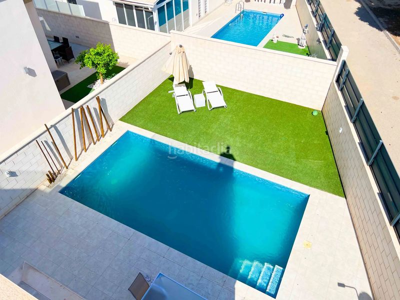Foto f0196516-4994-45dc-b867-e2326bb3520b. Casa amb xemeneia piscina a Rojales