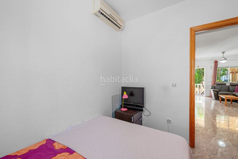 Foto f5a71d41-68f6-4e46-9450-f0c9705560db. Casa adossada amb piscina a La Zenia Orihuela