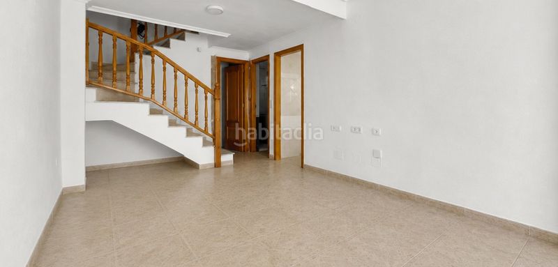 Foto 85fc4f9a-fe62-4416-82a1-3f6eb3304ac9. Casa adossada a Playa Flamenca Orihuela