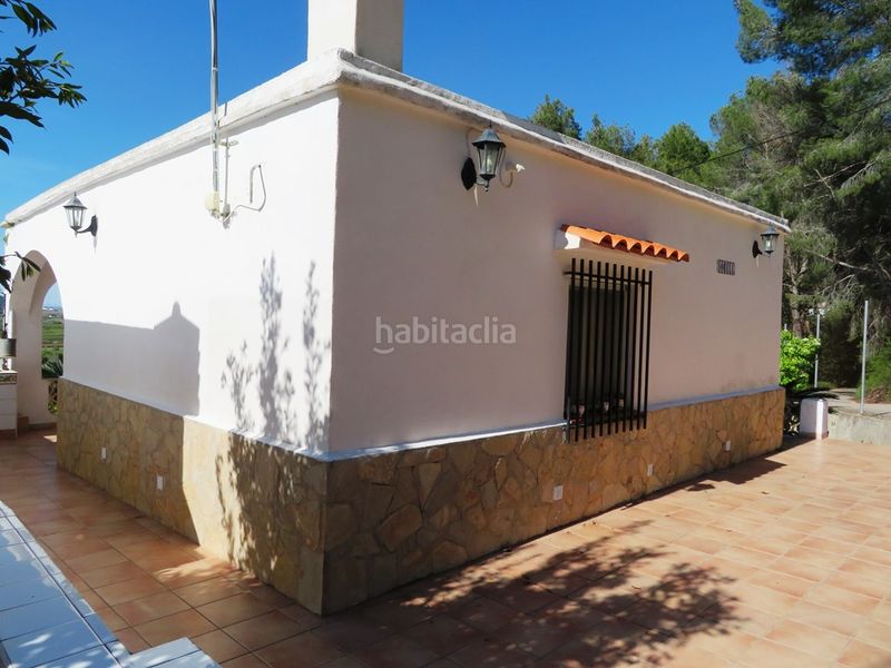 Foto c4e8dc2b-e811-4c83-a2bb-4921eb2af801. Masia amb aparcament a Pego