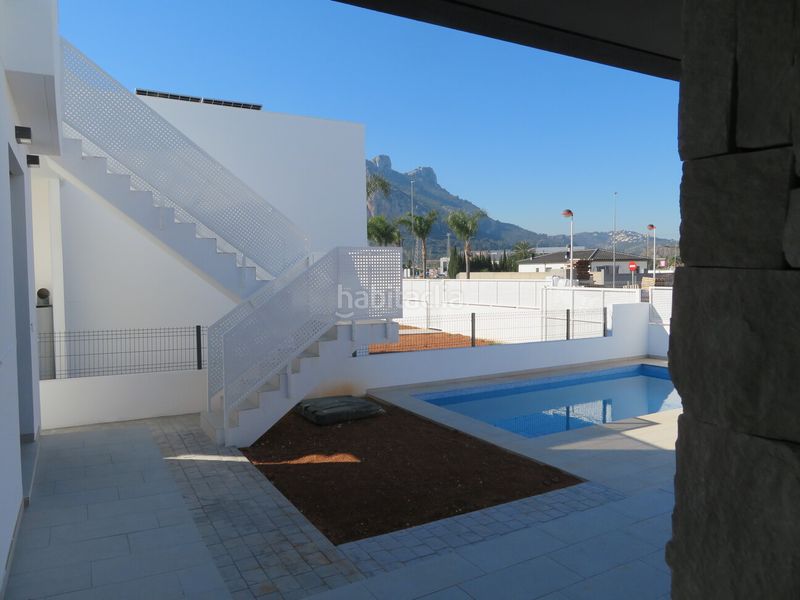 Foto 39cf6914-f390-46b3-ba01-518152c1ad3c. Casa adossada amb aparcament piscina a Poblets (els)