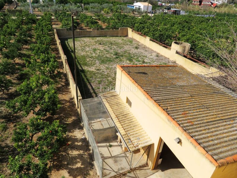 Foto 7c91db8d-6f34-4913-9f47-affd774283a4. Xalet amb xemeneia aparcament a Benidoleig