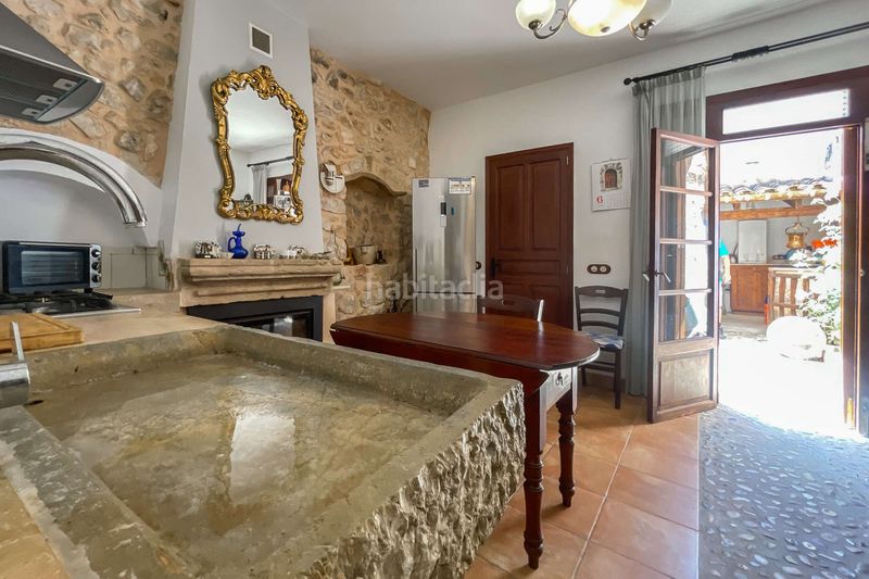 Foto cd0d1272-fdaa-481a-b540-36b0a6c26b35. Casa adossada a Petra