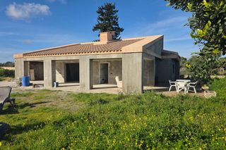 Masia a Santa Margalida Poble. Mallorquinische finca zum fertigstellen mit blick auf die bucht