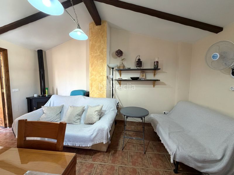Foto d808544a-d54a-42fe-b811-a994ec957bfe. Casa adossada amb xemeneia aparcament a Ardales