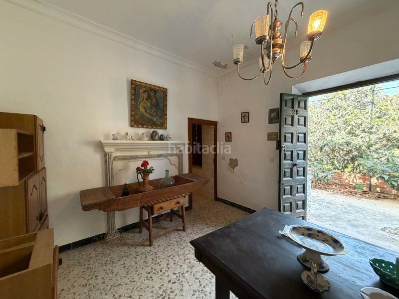 Foto 0cfb1aba-7c04-44ea-a7e4-969aa548c8a4. Masia amb xemeneia aparcament a Álora