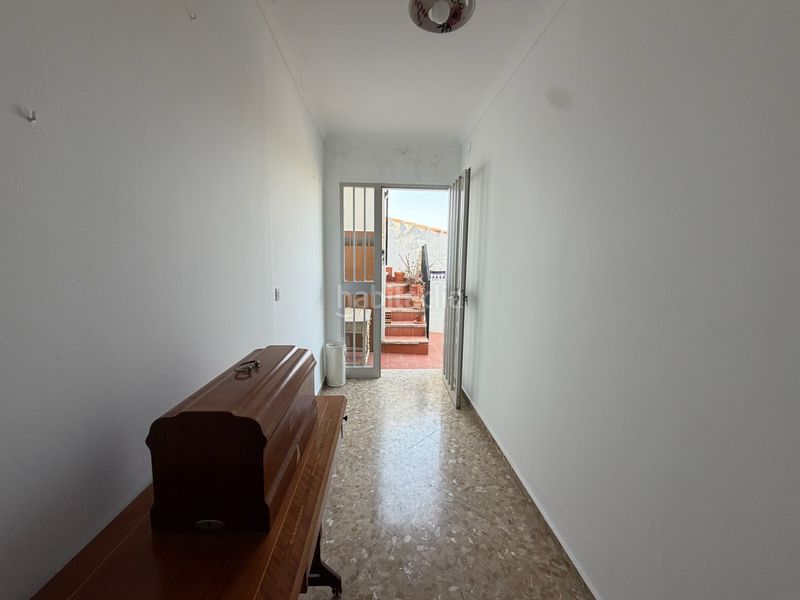 Foto 1ed6b075-42d9-4405-b83e-fb2c98872143. Casa adossada amb aparcament a Álora