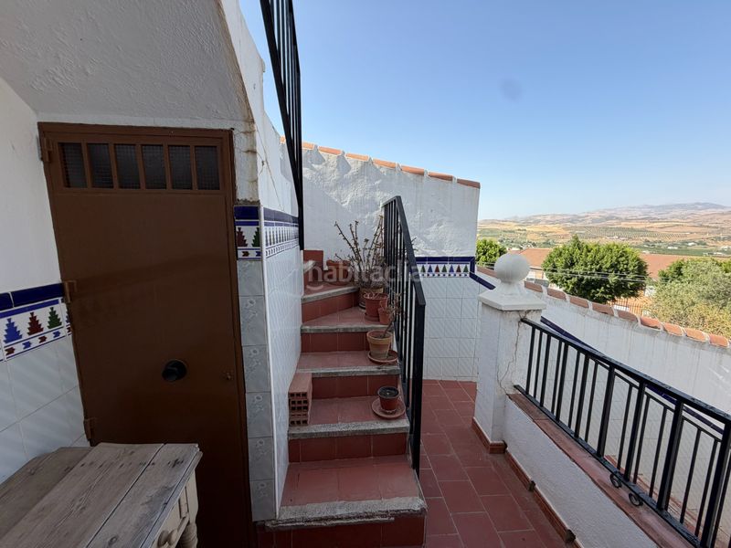 Foto c94ecfa9-5275-48f4-9cbf-3538b64f2561. Casa adossada amb aparcament a Álora